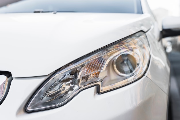 Stylish led headlight of white automobile