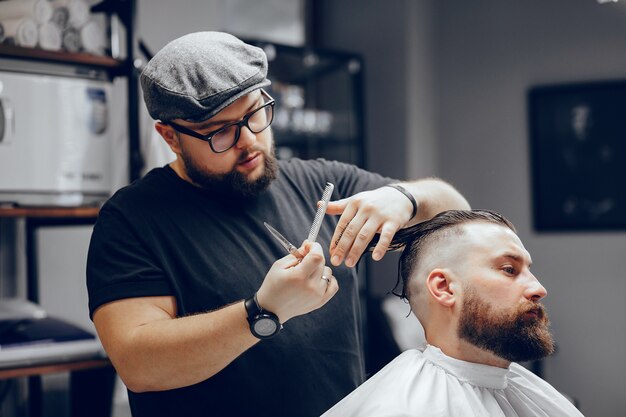 Stylish man sitting in a barbershop