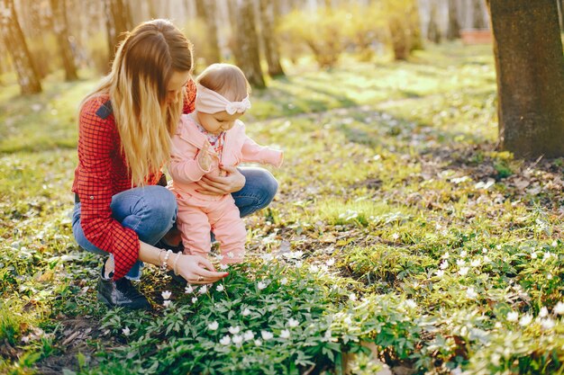 stylish mother with little daughter