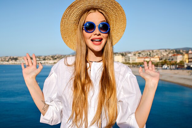 Stylish pretty blonde woman with long hairs