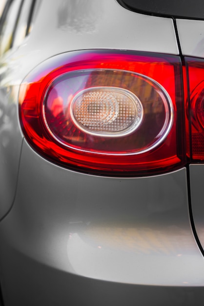 Free photo stylish rear light on new silver car