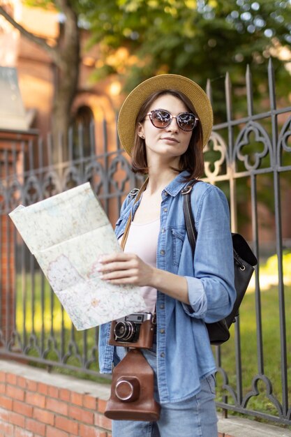 Stylish tourist with hat and sunglasses