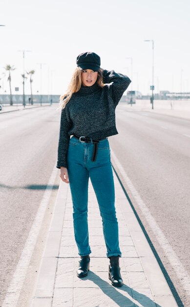 Stylish woman on road