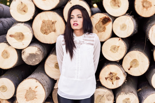 Stylish woman with red lips and long hair