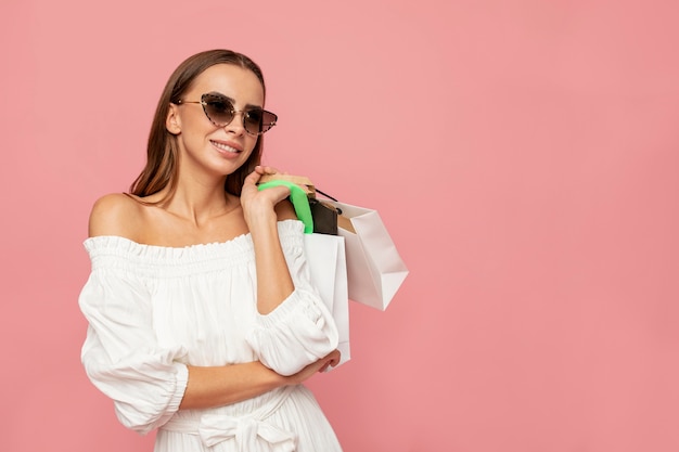 Stylish woman with shopping bags