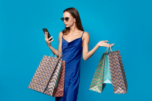 Stylish woman with shopping bags