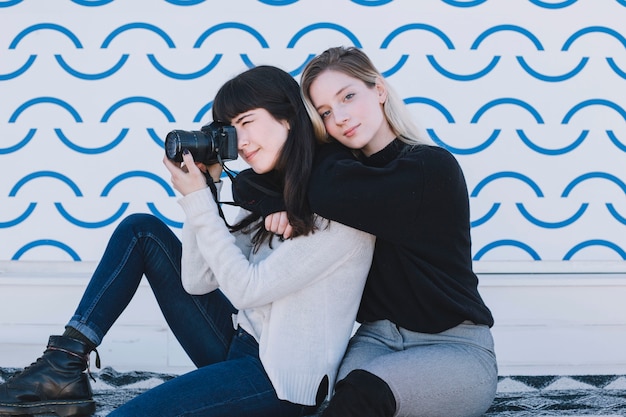 Stylish women spending time outside in leisure