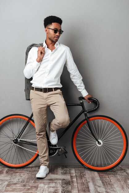 Stylish young afro american man in sunglasses