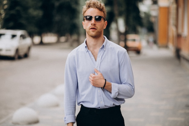 Stylish young handsome man in classy outfit