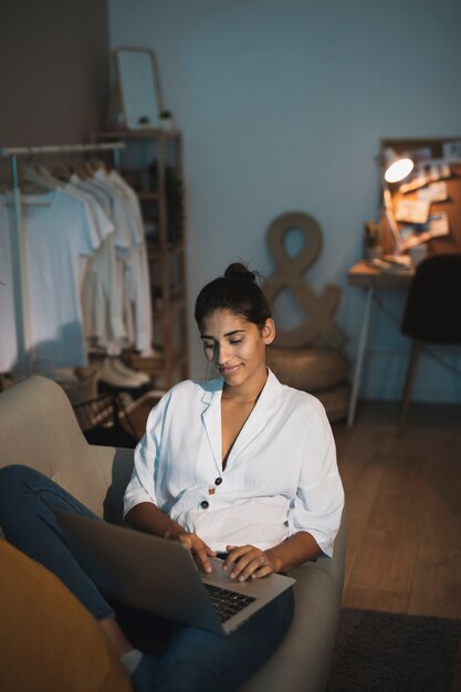 stylish young lady working on laptop