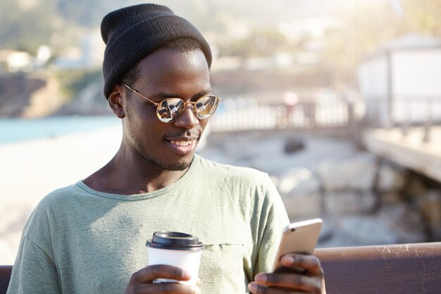 Stylish young man at the beach