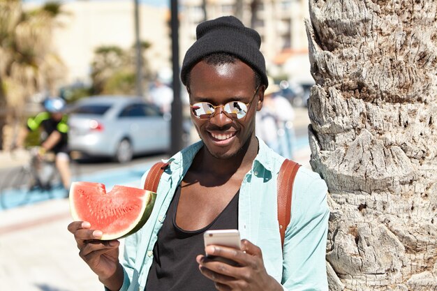 Stylish young man at the beach