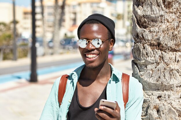 Stylish young man at the beach