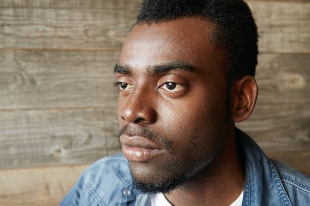 Stylish young man sitting in cafe