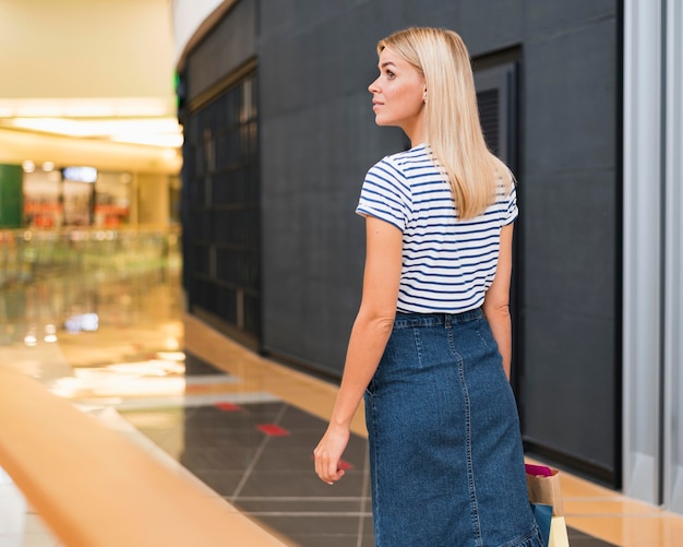 Stylish young woman looking away