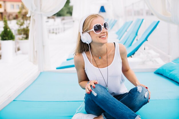 Stylish young woman relaxing with music