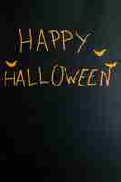 Free photo stylized happy halloween caption with bats