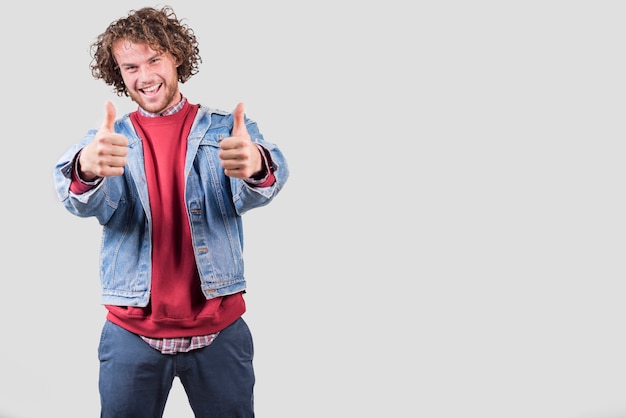Success concept with man doing thumbs up
