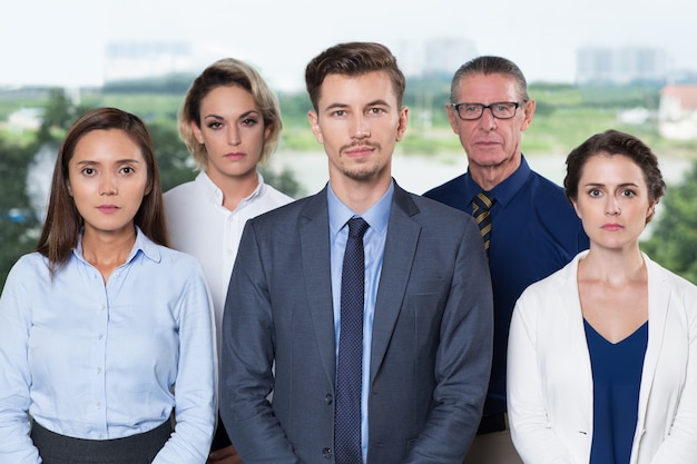 Successful Business Team Standing in Office