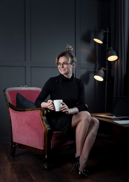 Free photo successful businesswoman looking away