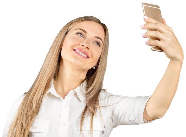 Successful businesswoman with cell phone isolated on white background