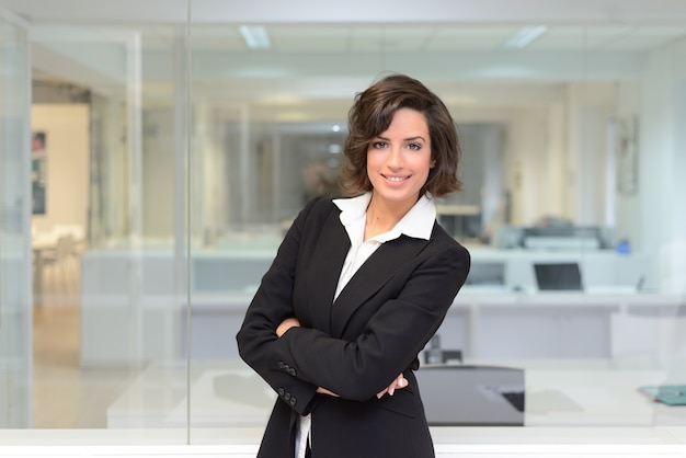 Successful employee with white shirt and black suit