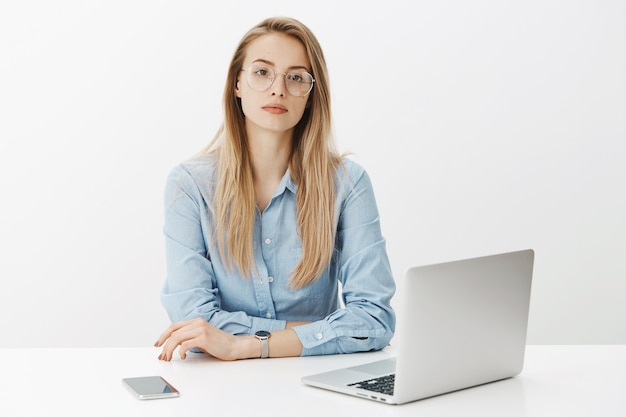 Successful female entrepreneur in blue collar shirt