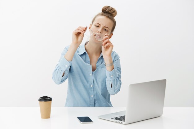 Successful female entrepreneur in blue collar shirt