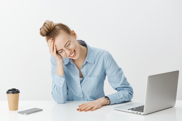 Successful female entrepreneur in blue collar shirt