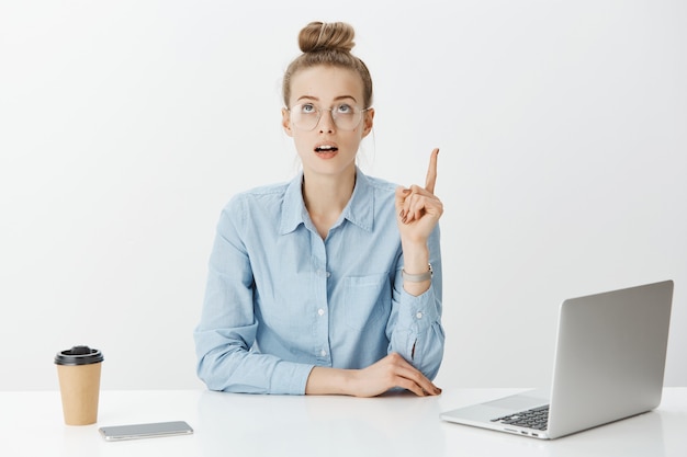 Successful female entrepreneur in blue collar shirt