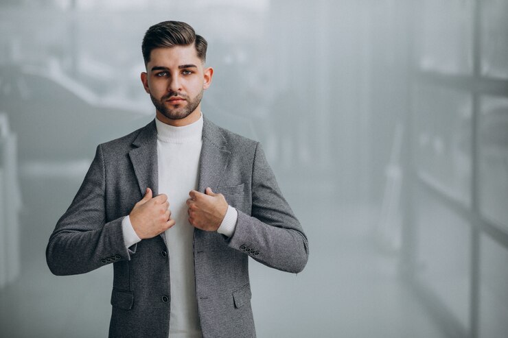 Free Photo successful handsome business man in an office