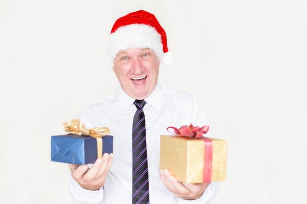 Free photo successful man excited about christmas gifts