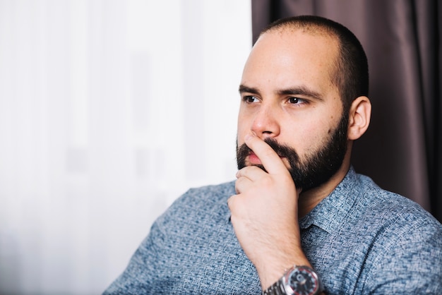 Free photo successful man thinking with concentration