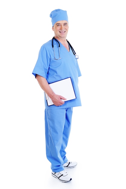 Successful mature male surgeon with a smile holding folder