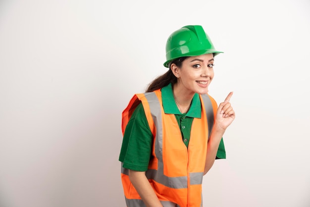 Free photo successful woman in hardhat wearing uniform . high quality photo