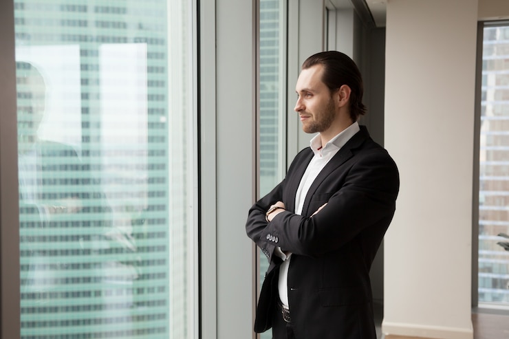 Free Photo successful young handsome businessman 