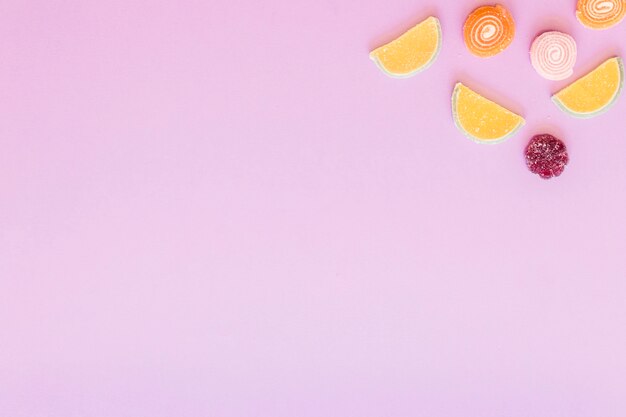 Free photo sugar candies on pink background