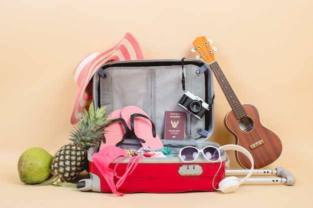 Free photo suitcase with traveler accessories