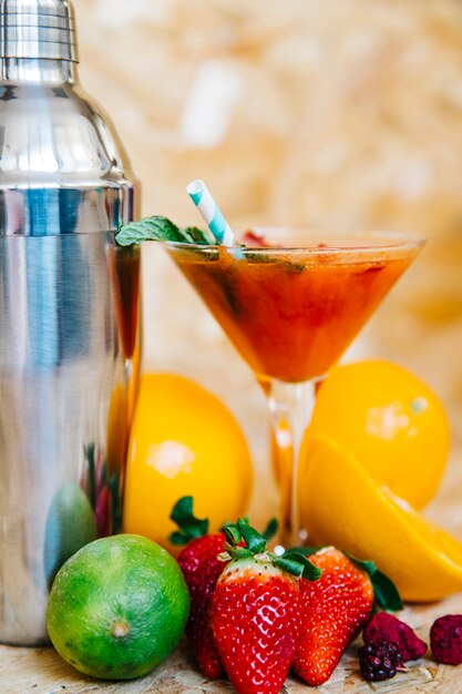 Summer cocktail and tropical fruits