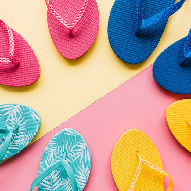 Summer concept with flip flops forming circle