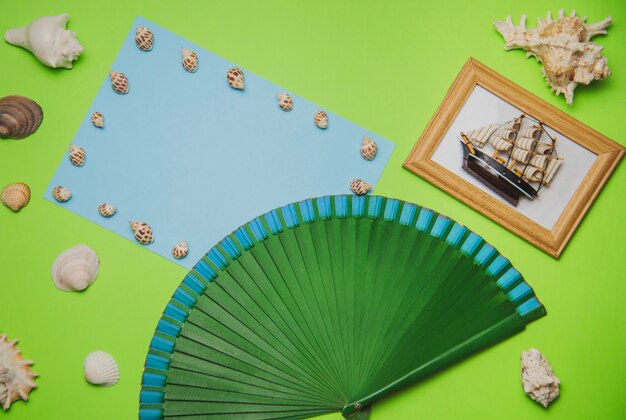 summer concept with paper and spanish fan