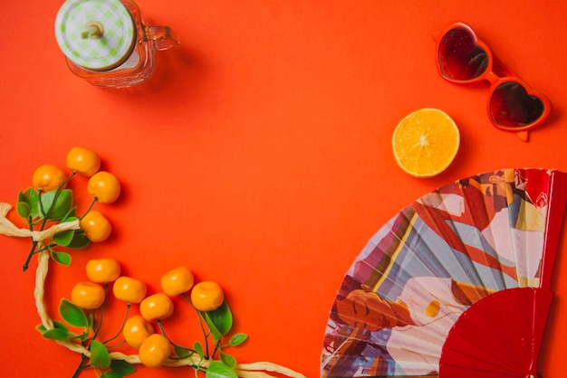 Summer decoration with oranges and spanish fan