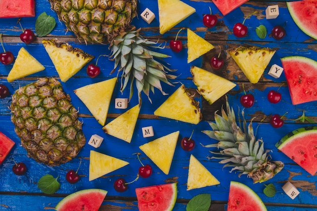 Summer fruits on wooden surface