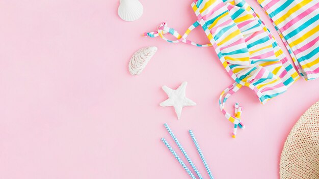 Summer marine items on pink background