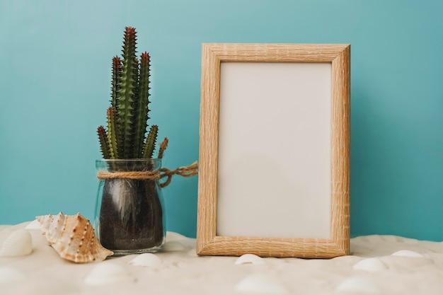 Summer scene of cactus and white chalkboard