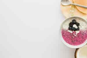 Free photo summer smoothie in bowl and copyspace