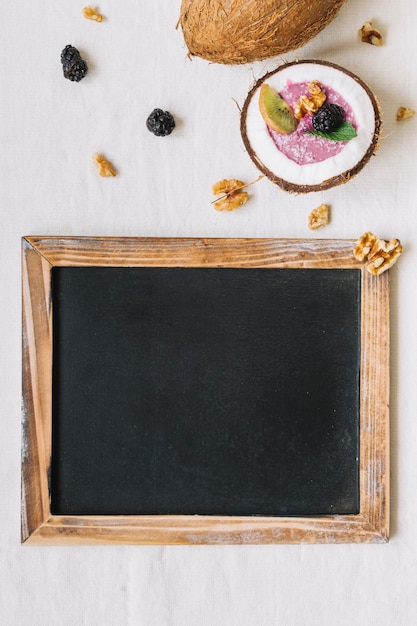 Summer smoothie in coconut and slate