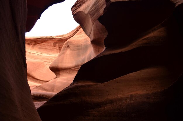 Sun shining on Antelope Canyon's red rock walls.