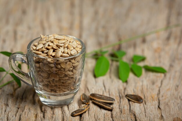 Sunflower seeds on the wooden board