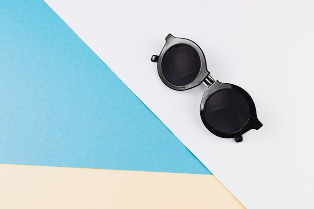 Sunglasses on geometrical background